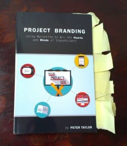 Project Branding book with sticky notes in the pages