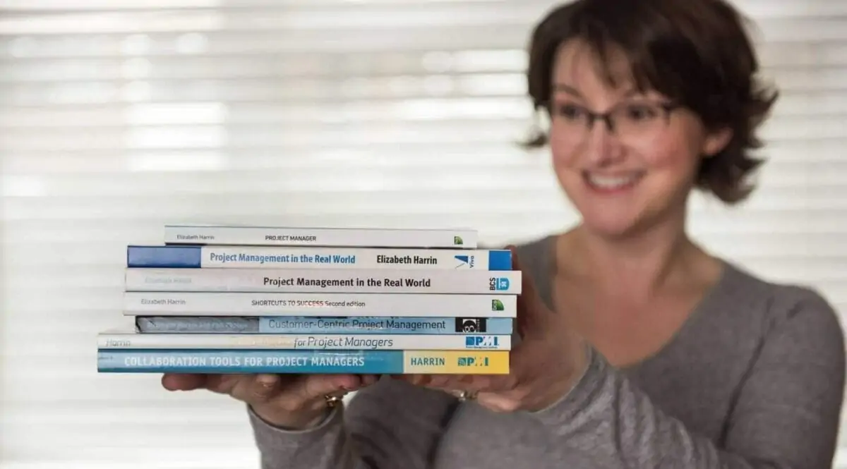 Elizabeth Harrin holding her books