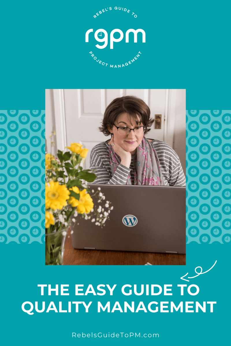 Elizabeth sitting at a desk with some yellow flowers. The easy guide to quality management