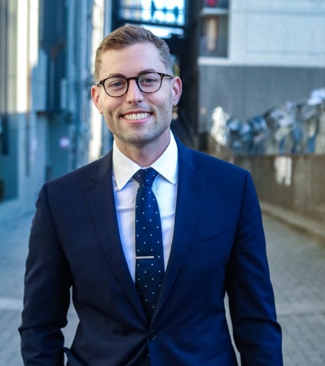 Edward Hones wearing a suit