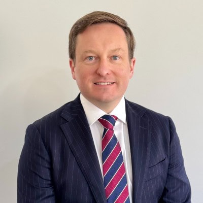 Oliver Morrisey wearing a suit