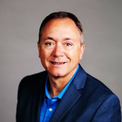 Todd Riesterer wearing a blue suit