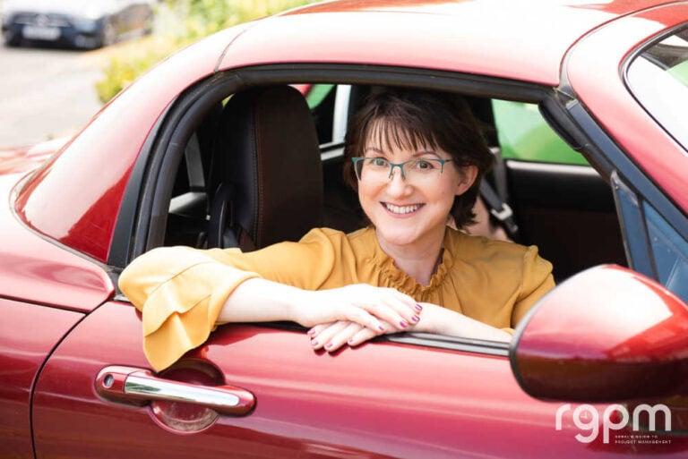 Elizabeth Harrin sitting in a red car